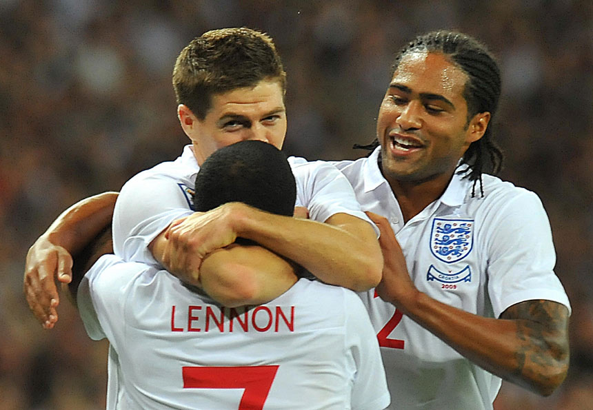 Aaron Lennon, Steven Gerrard and Glen Johnson celebrate against Croatia.